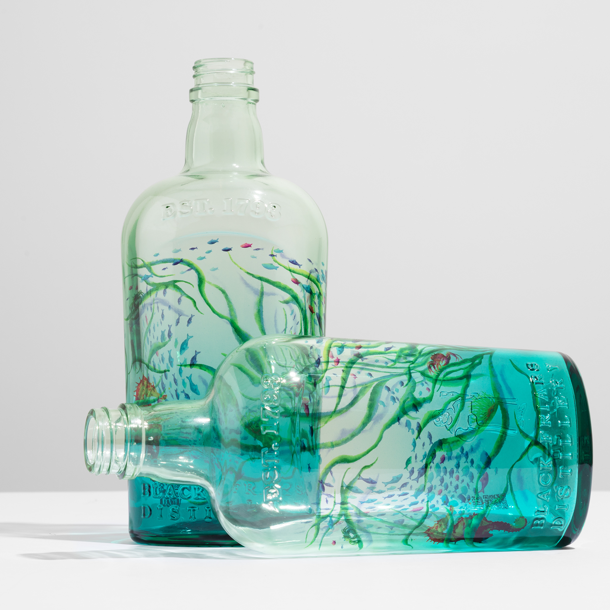 Plymouth Gin Ocean Edition Year 2 and Year 3 — full-body sublimation bottles with ocean conservation artwork