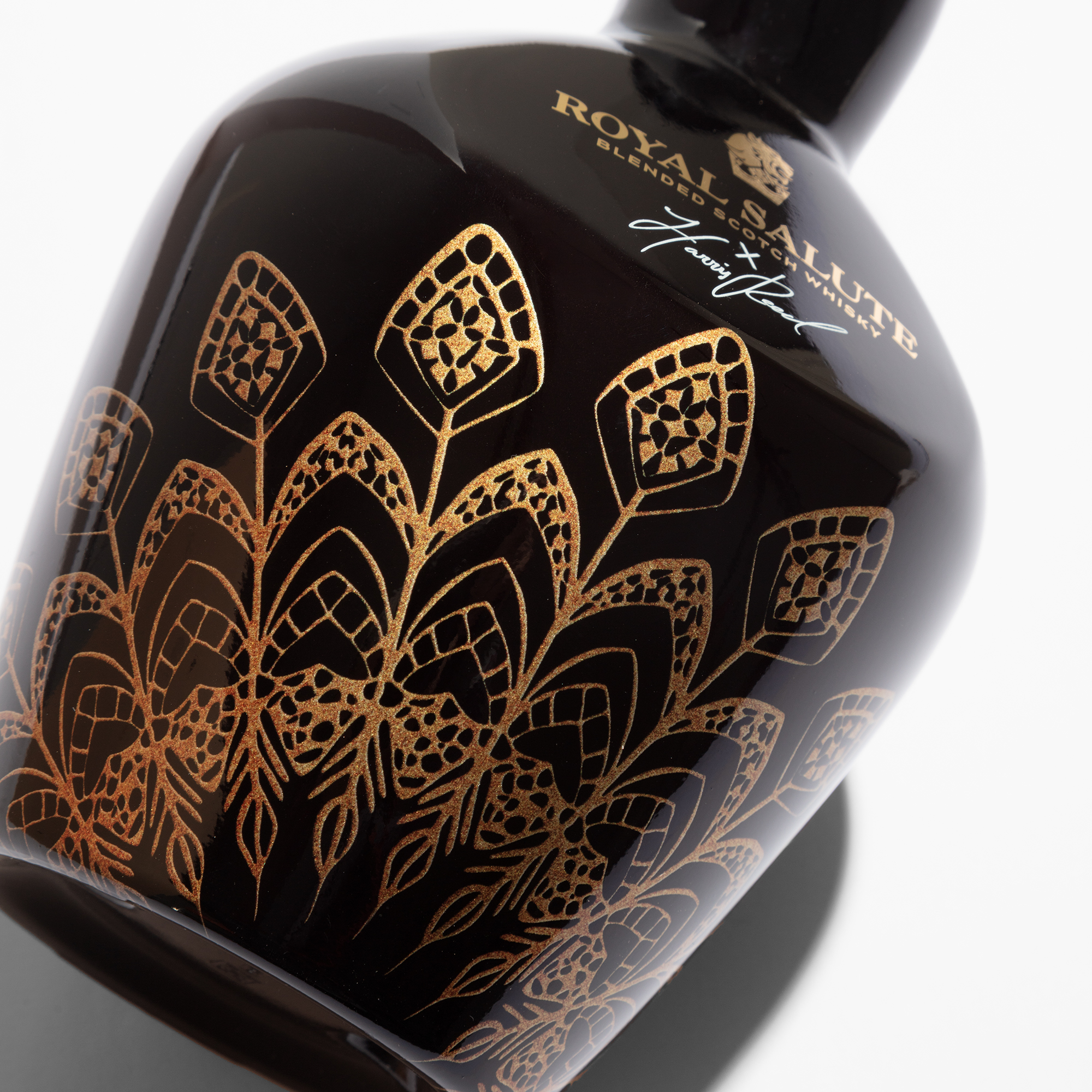 Royal Salute Fashion Collection — Harris Reed gold leaf motif on black glass flagon, decorated by ATIU